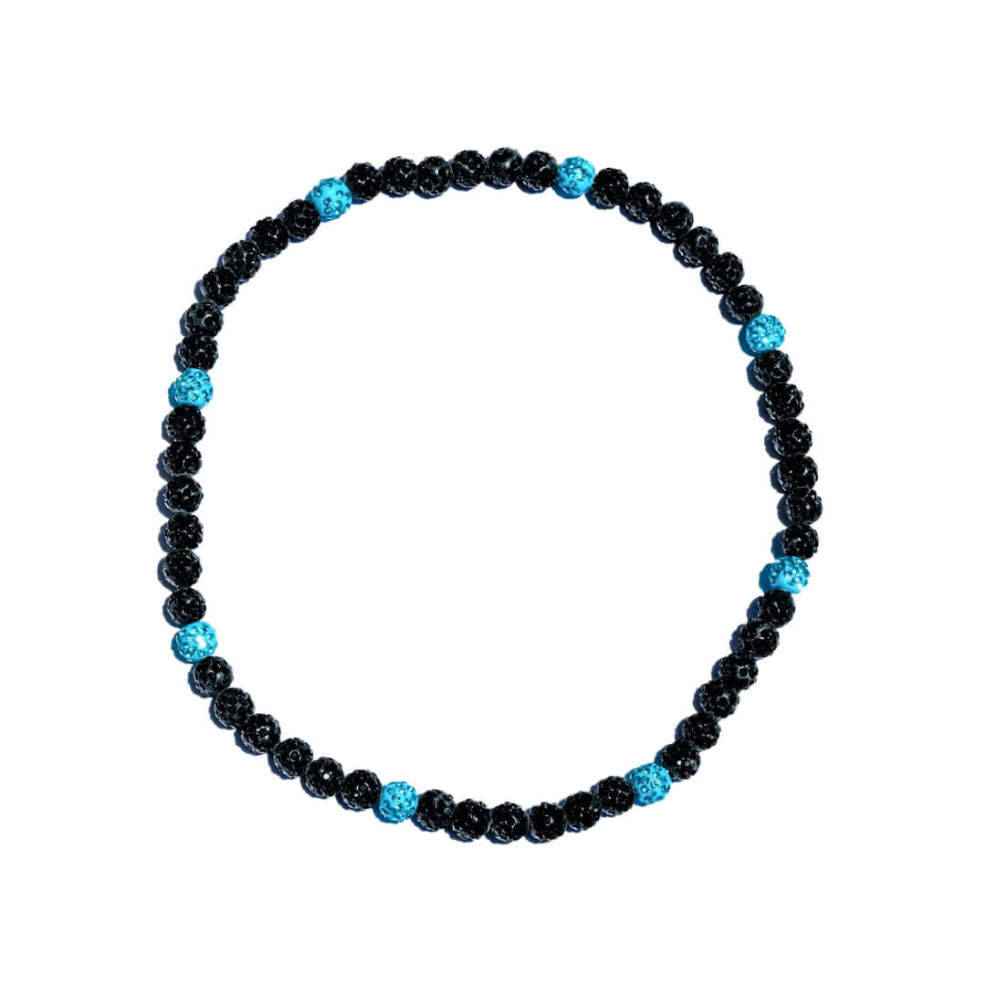 Black and blue beaded necklace on a white background