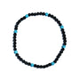 Black and blue beaded necklace on a white background