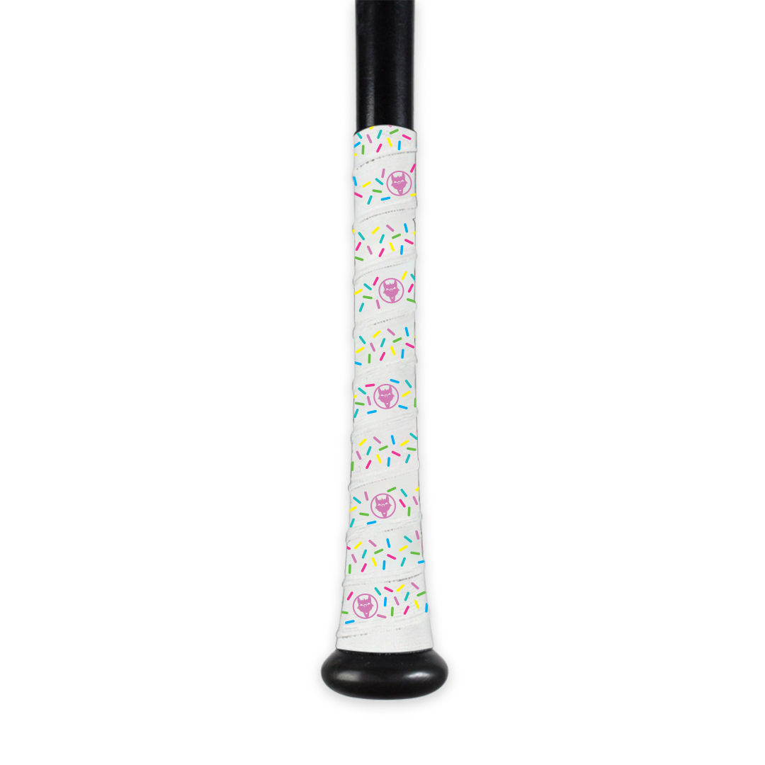 White Donut Bat Grip Tape on a black baseball bat, featuring colorful donut and sprinkle design.