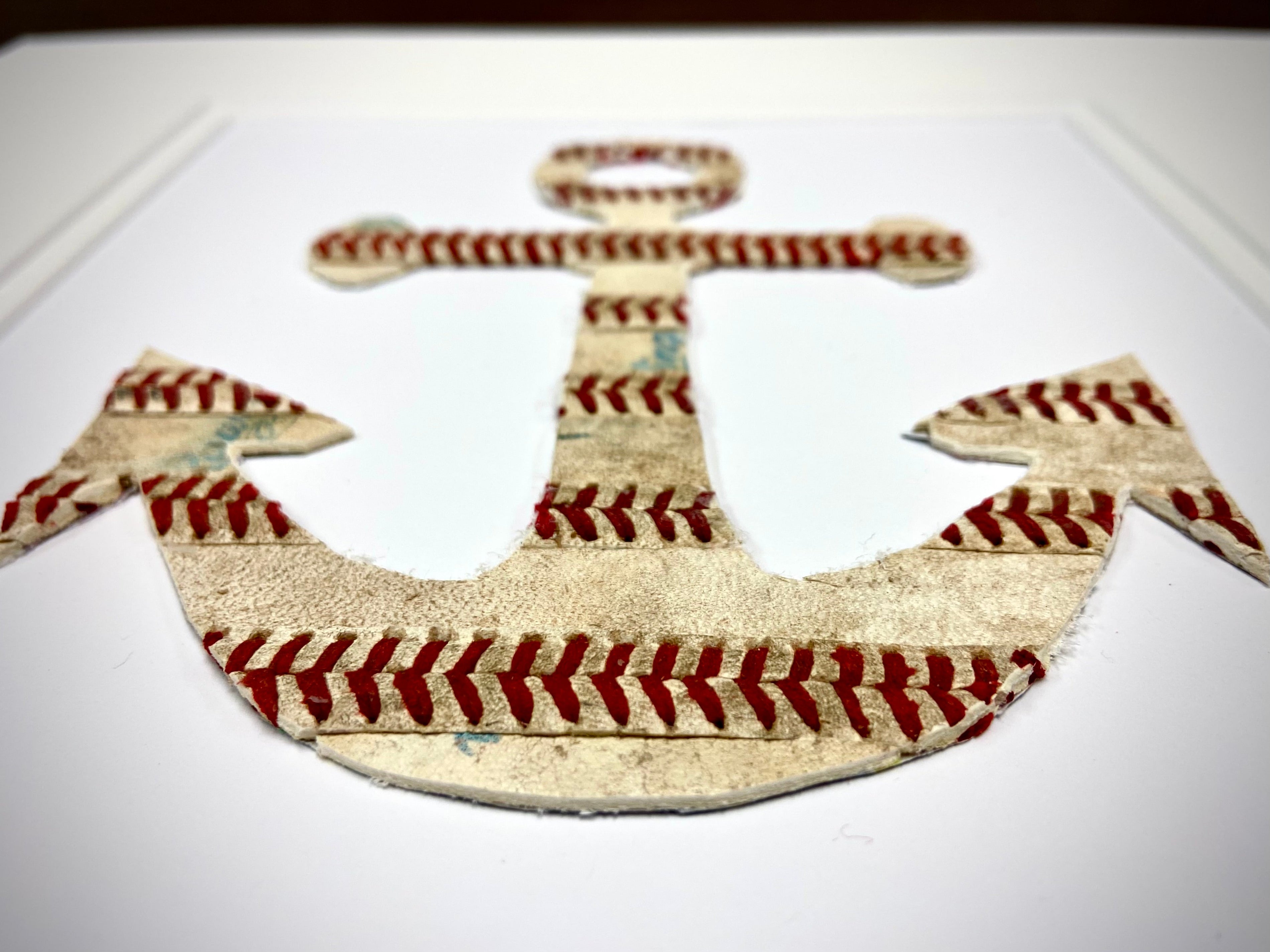 The Anchor Original Artwork - Made from Actual Used Baseballs, featuring a unique anchor design stitched with baseball leather.