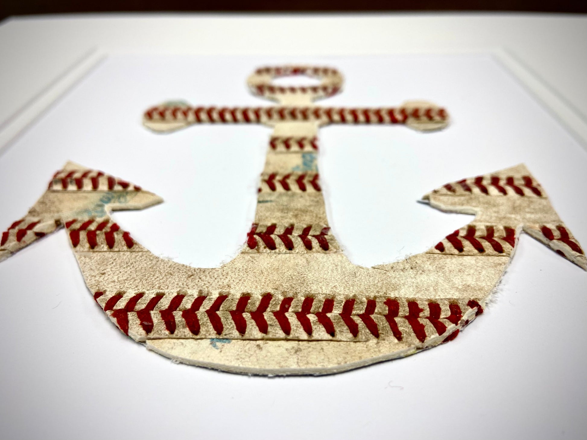 The Anchor Original Artwork - Made from Actual Used Baseballs, featuring a unique anchor design stitched with baseball leather.
