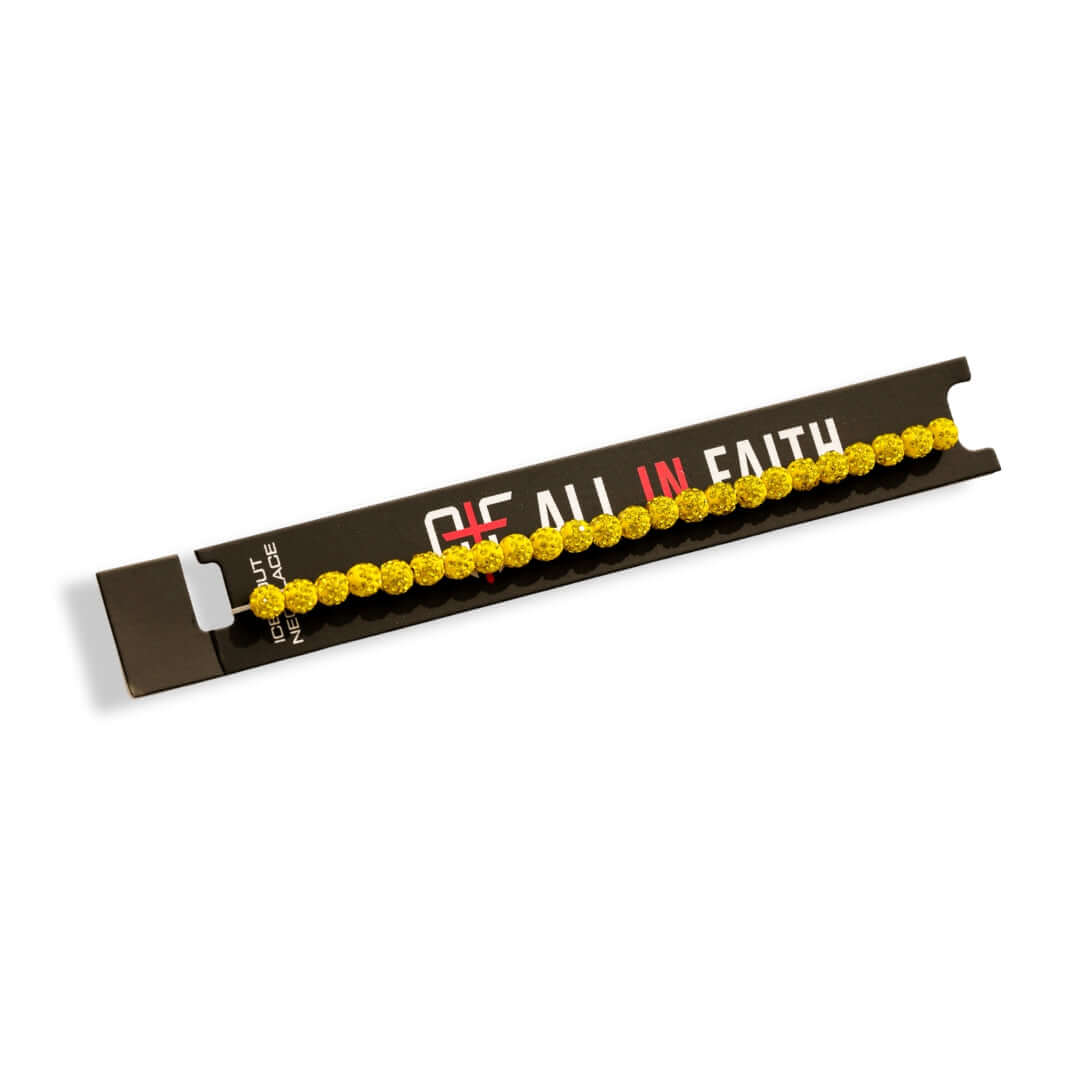 Banana Yellow Iced Out Baseball Bead Necklace displayed on a black packaging with bold text.