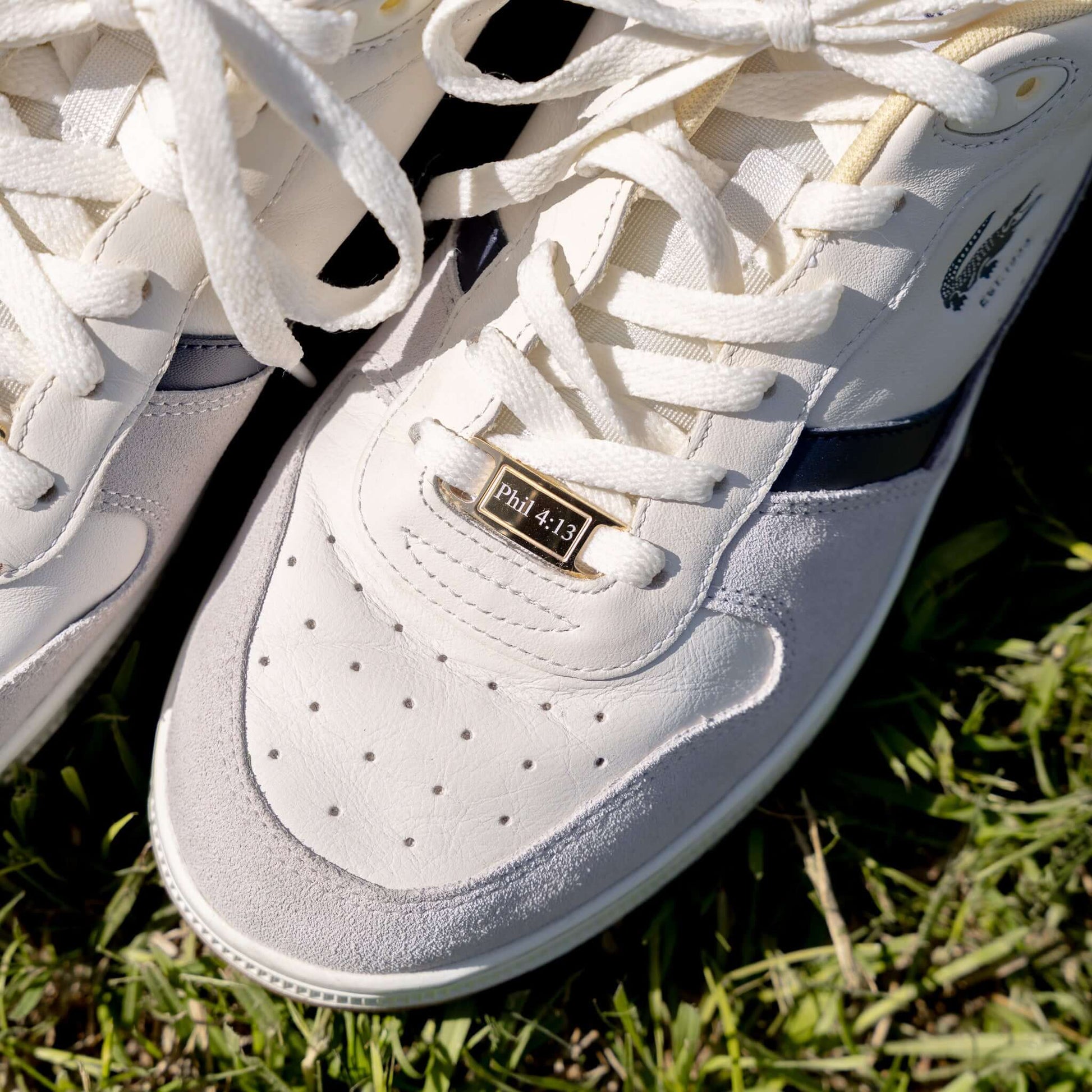 White sneakers with gold customizable AF1 air force one shoe tags 