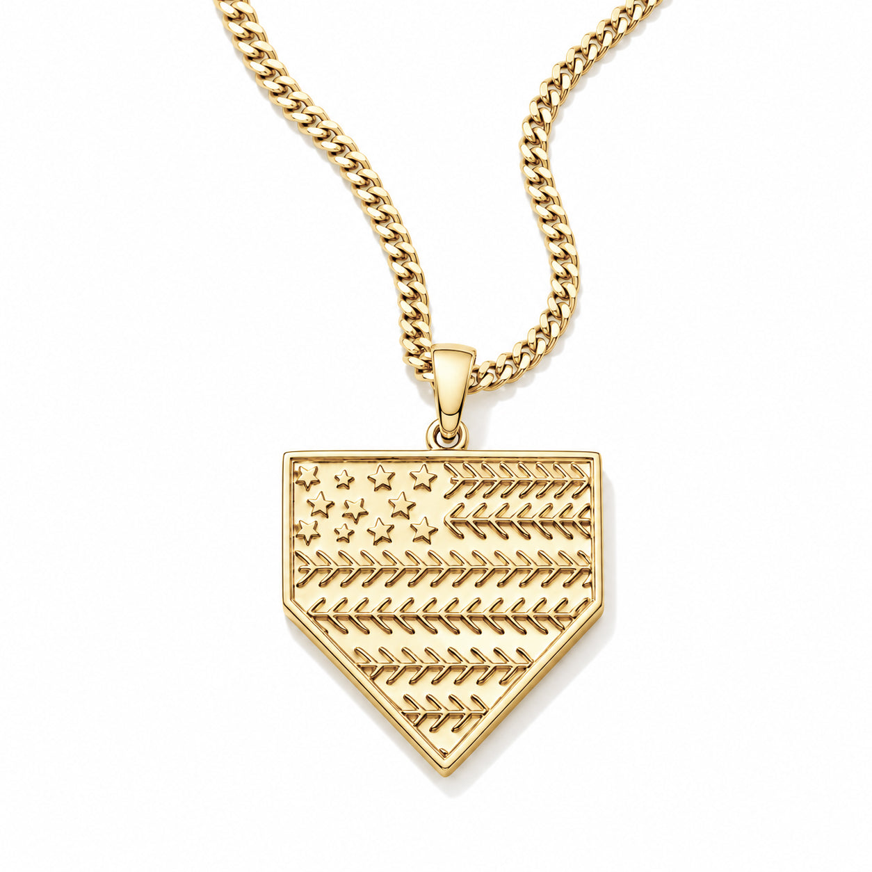 A gold baseball-shaped pendant necklace featuring an engraved American flag design with stars and stripes, suspended from a gold curb chain against a white background.