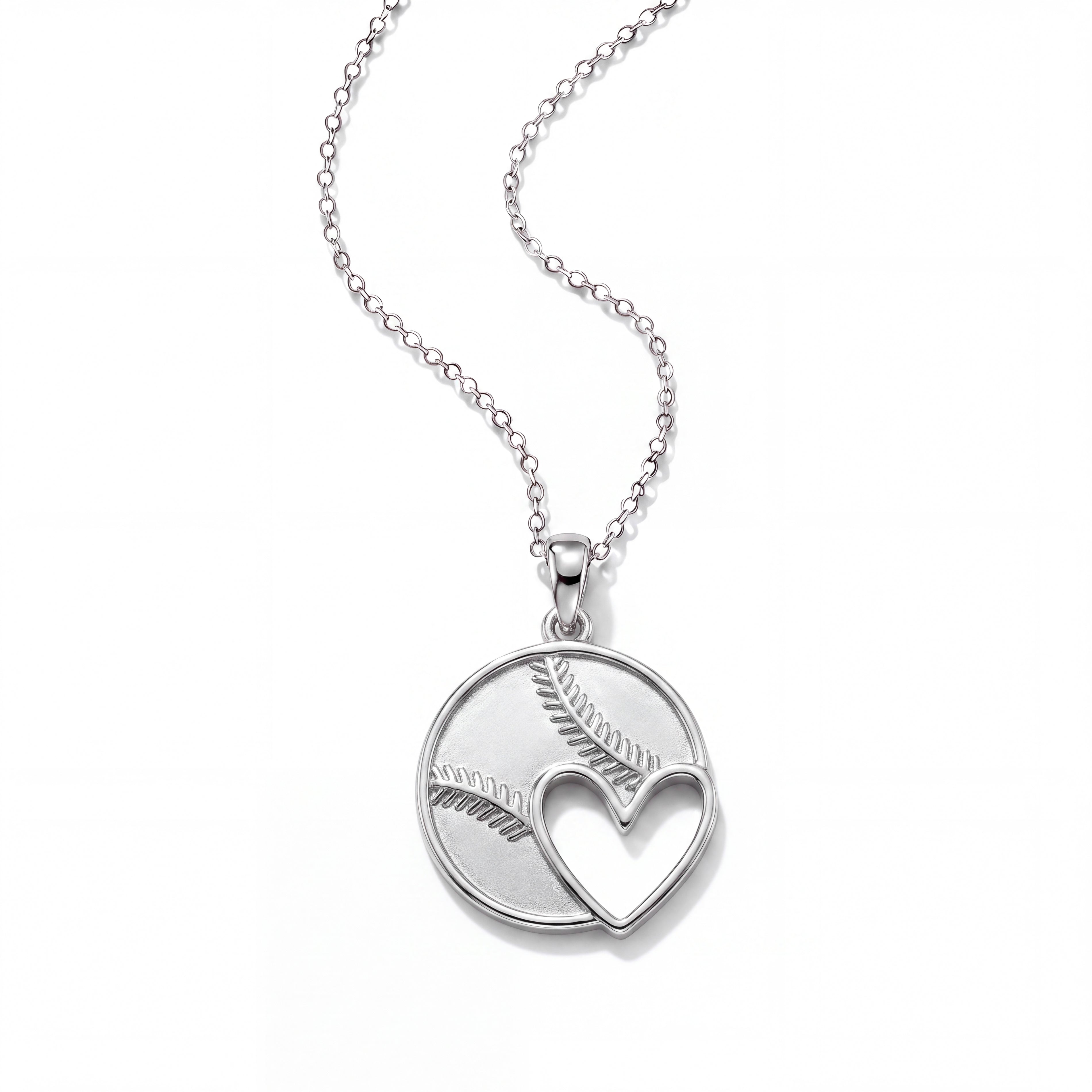 All In Faith Baseball Heart Necklace in sterling silver with heart-shaped pendant and baseball stitching