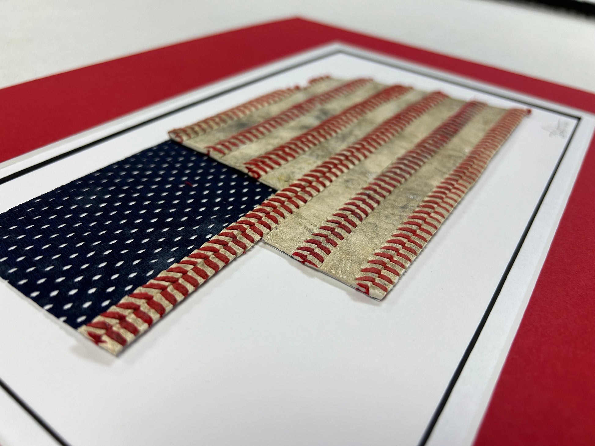 Nebraska Baseball Artwork - Made from Reclaimed Baseballs featuring U.S.A. flag style design made from used baseballs.