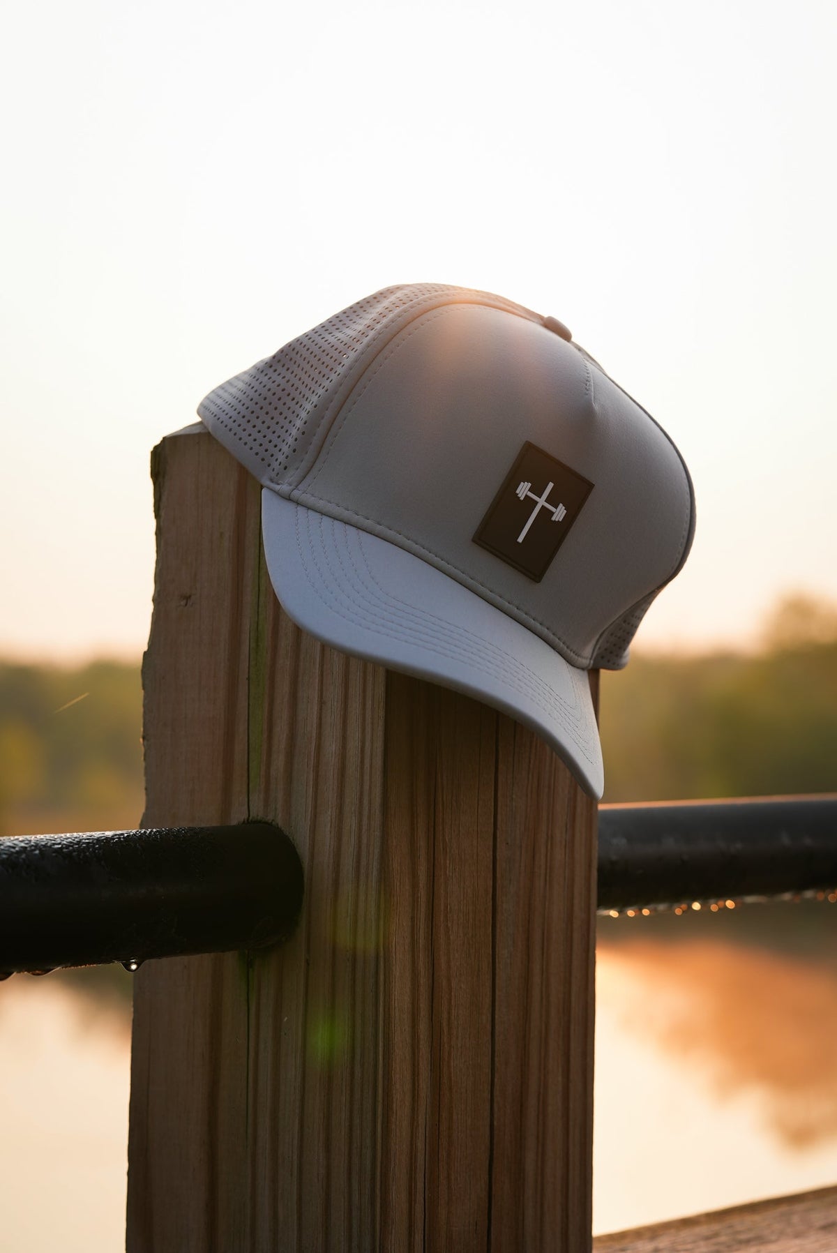 HolStrength Signature Hat with cross and barbell logo lifestyle view