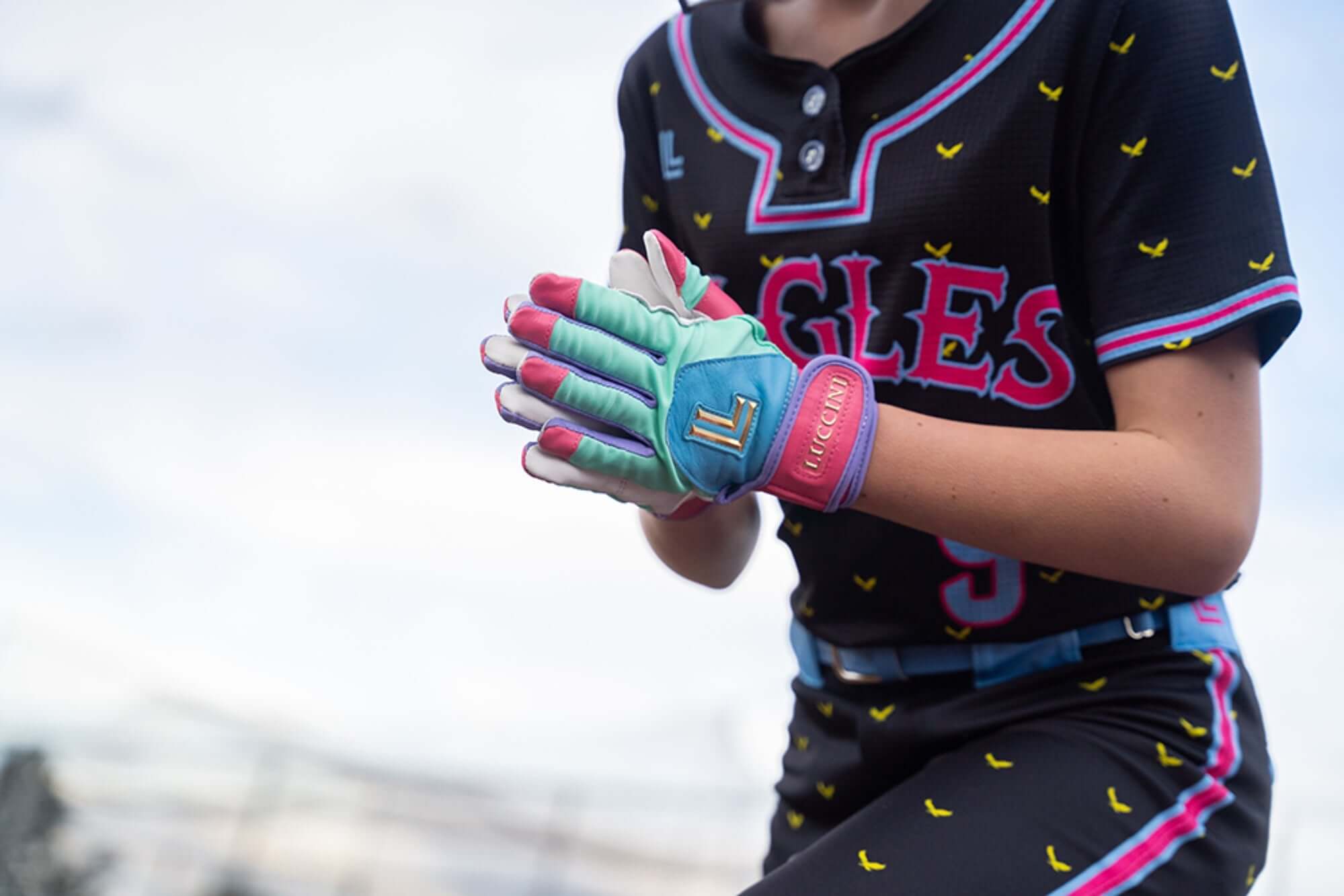 Jessica Mendoza Signature Series Luccini Batting Gloves for Softball with vibrant colors and grip features.