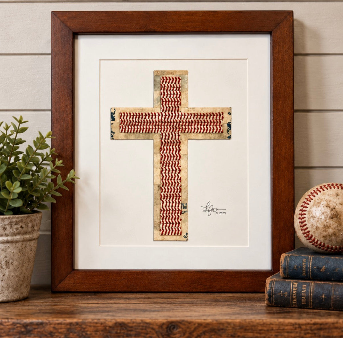 The Baseball Seams Company Traditional Cross baseball artwork made from used baseball seams, framed display view