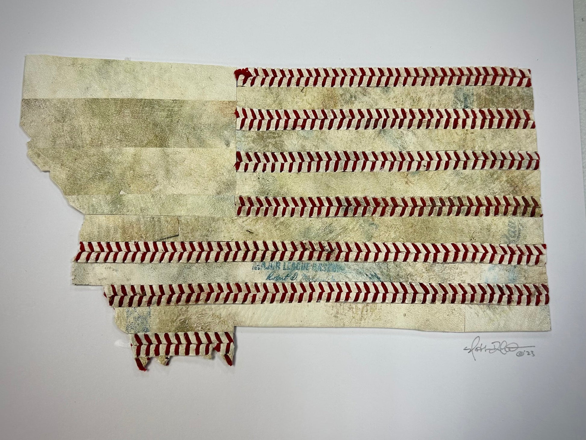Montana Original Baseball Artwork - made from used baseballs, featuring a flag design crafted from baseball pieces.