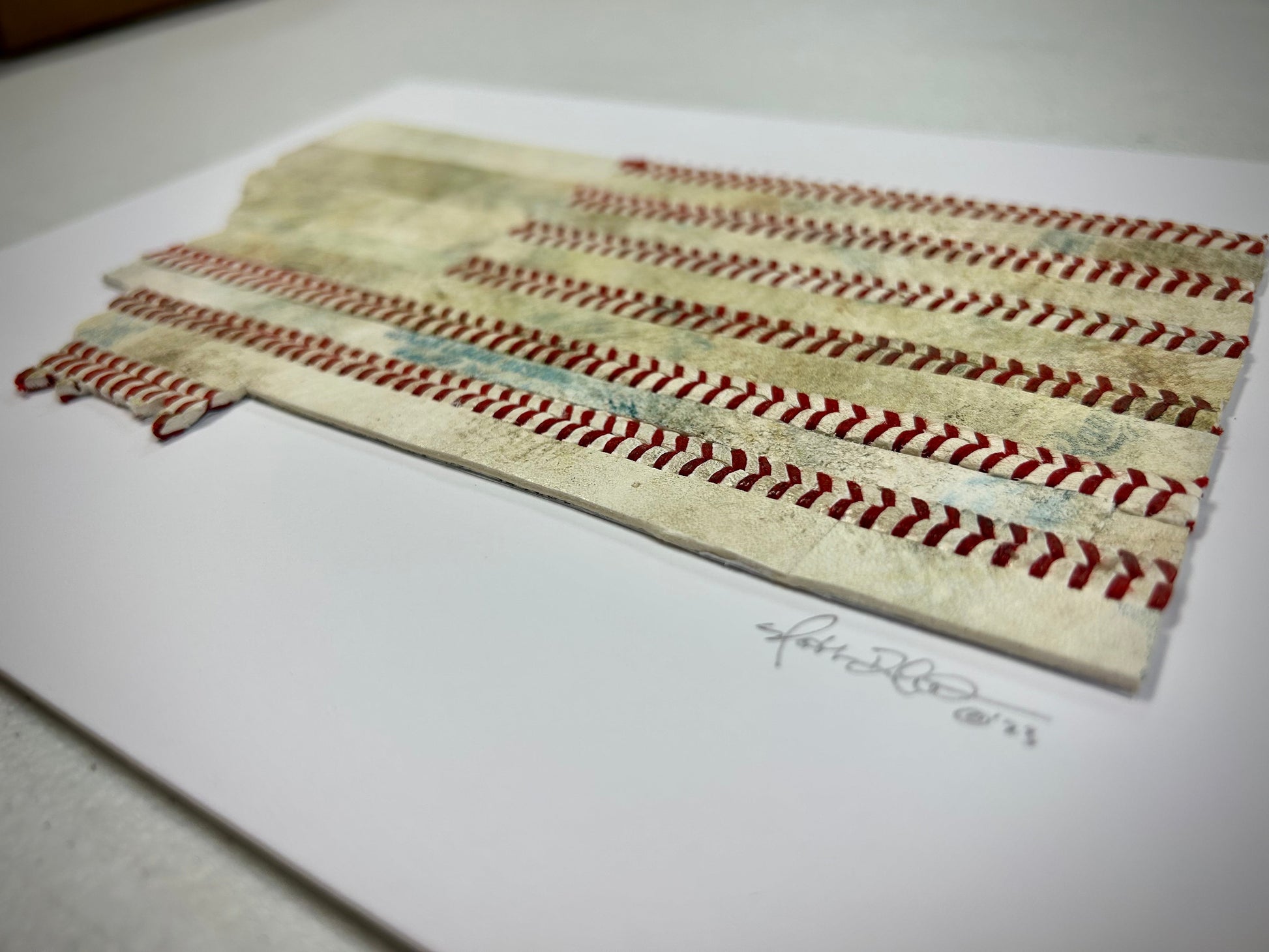 Montana Original Baseball Artwork - made from used baseballs featuring a flag design handcrafted from actual baseballs.