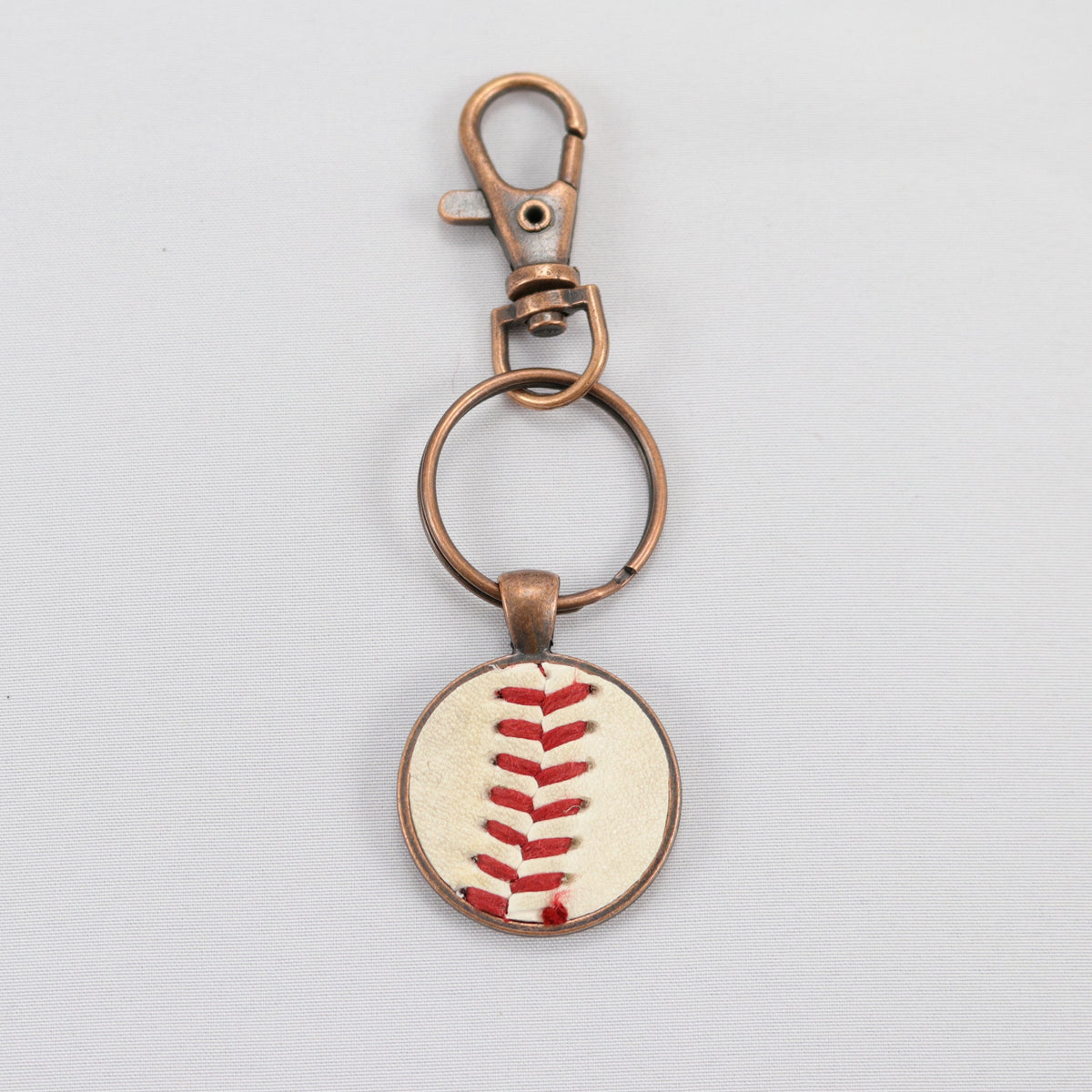 The Baseball Seams Company Baseball Seam Keychain made with used baseball seams, product detail view