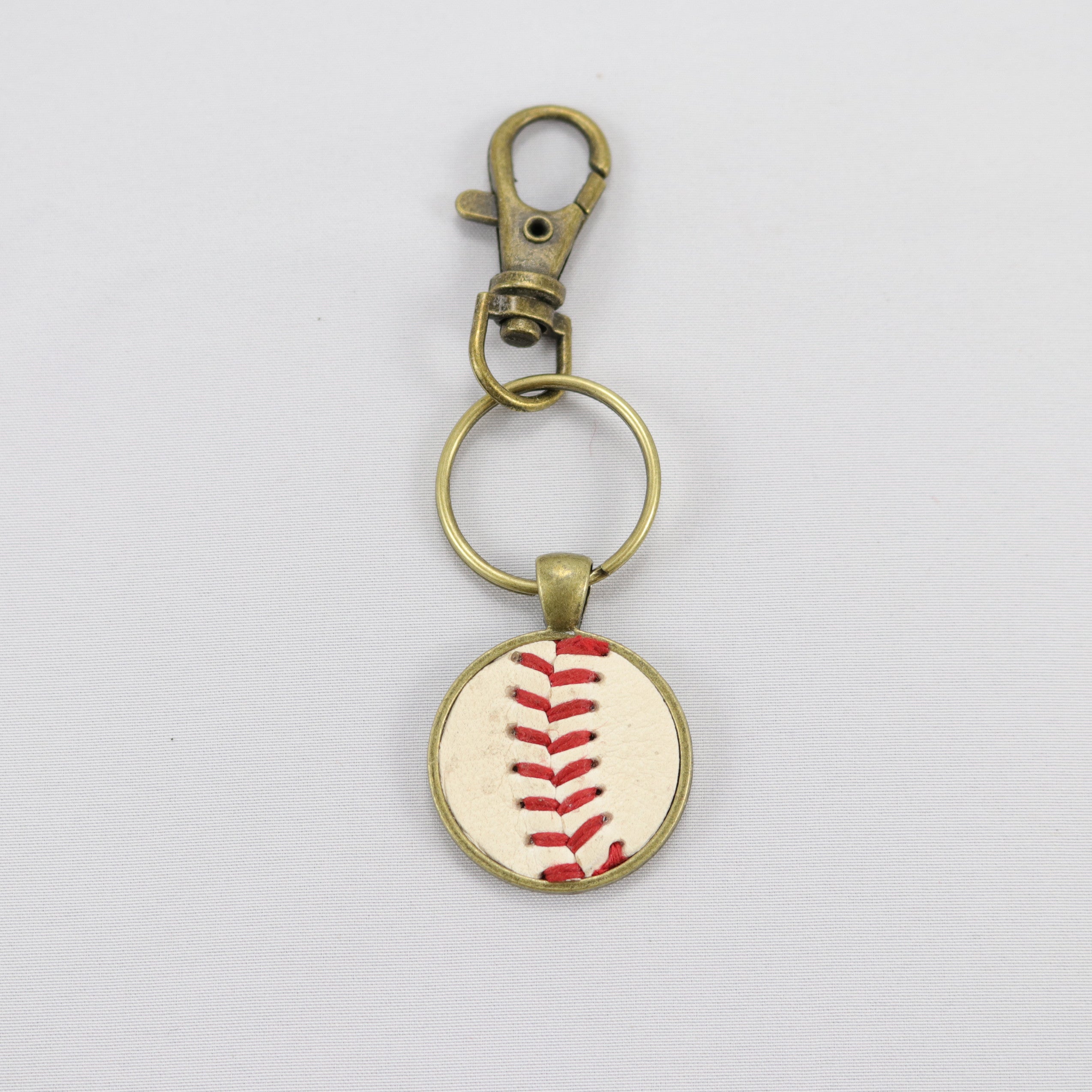 The Baseball Seams Company Baseball Seam Keychain made with used baseball seams, product detail view