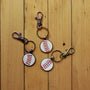 The Baseball Seams Company Baseball Seam Keychain made with used baseball seams, product detail view