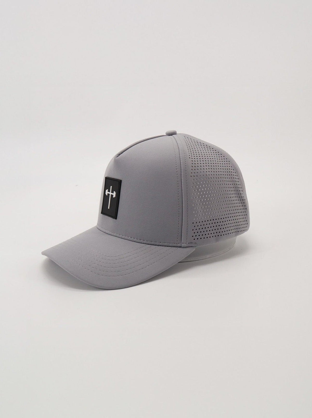 HolStrength Signature Hat with cross and barbell logo lifestyle view