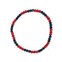 Beaded bracelet with red and black beads on a white background