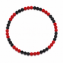 A beaded stretch bracelet featuring alternating rows of glossy red and textured black beads, arranged in a circular shape on a solid white background.