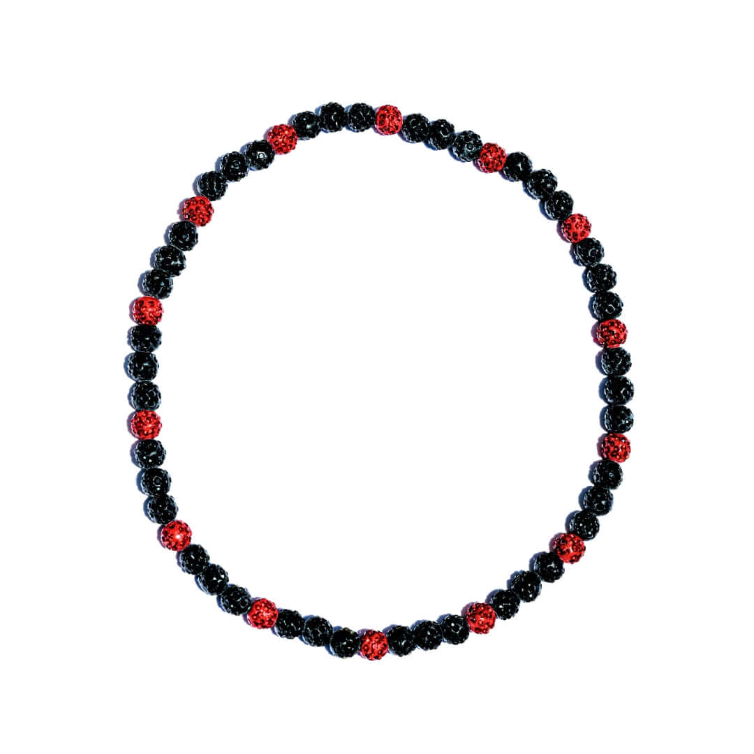 Necklace with black and red beads on a white background