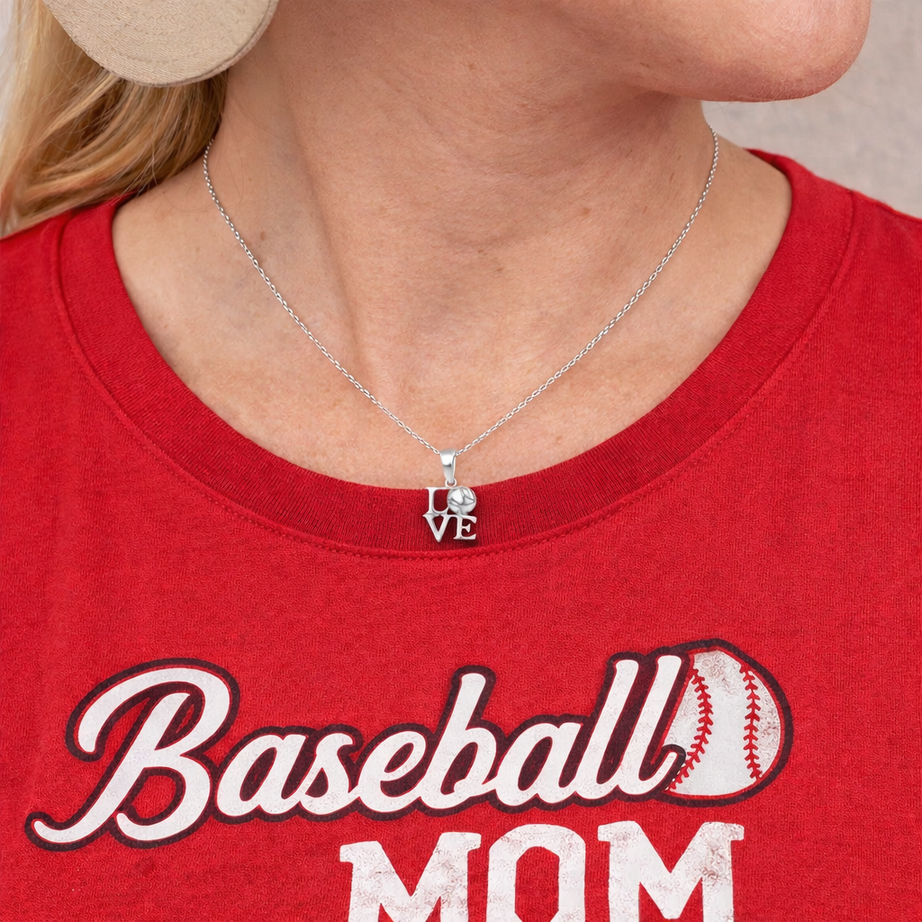 Baseball mom wearing an all in faith LOVE necklace pendant
