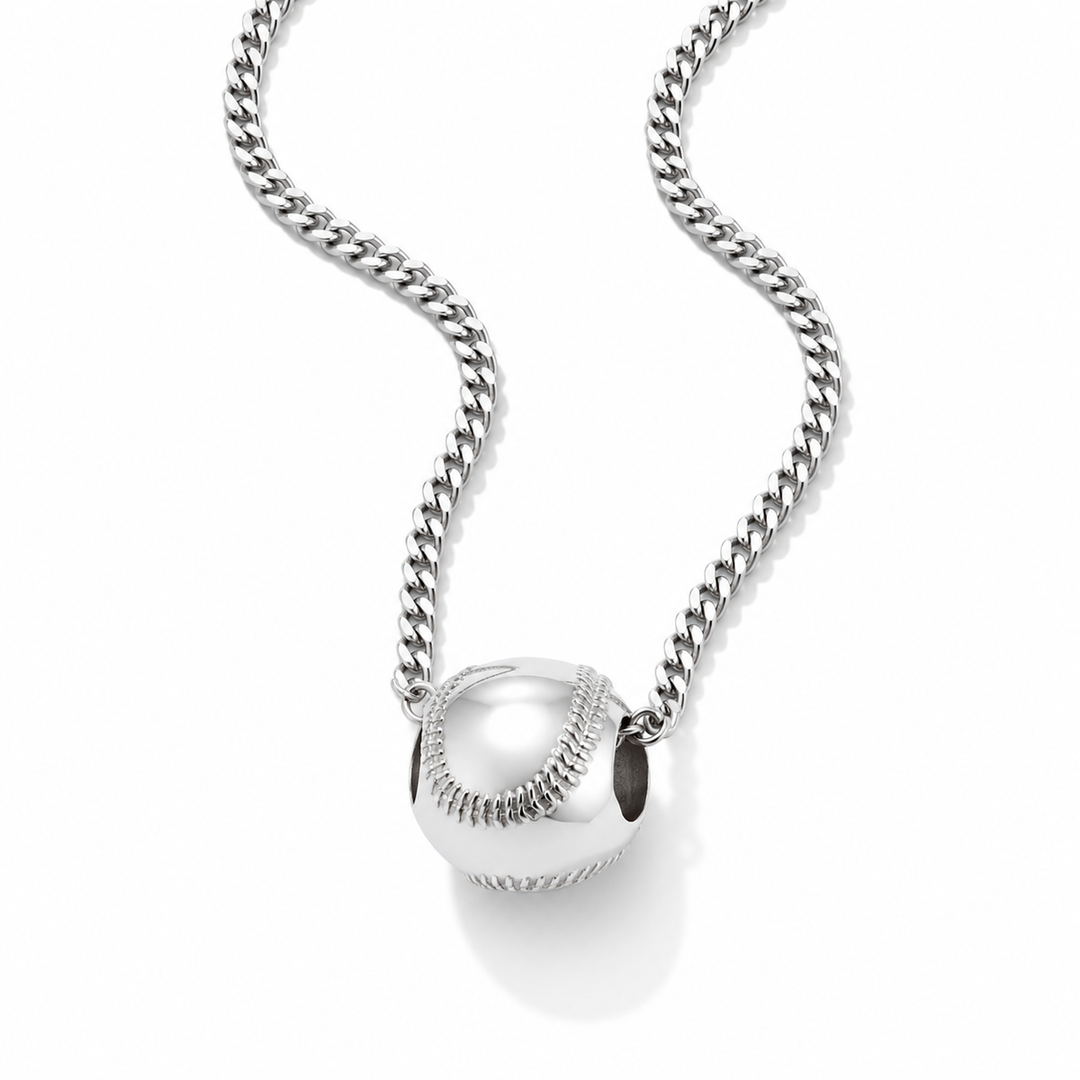 A silver baseball pendant necklace on a matching curb chain, shown against a clean white background with a soft shadow.
