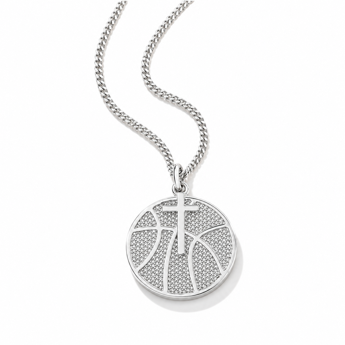 A silver-toned round pendant necklace featuring a basketball design paved with small clear stones, suspended from a matching curb chain on a white background.