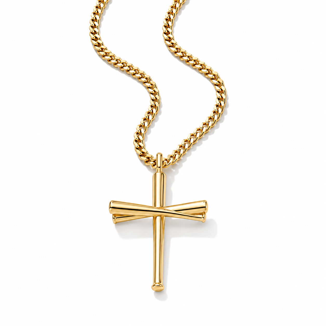 A polished yellow gold cross pendant necklace with a matching curb chain, shown on a clean white background.