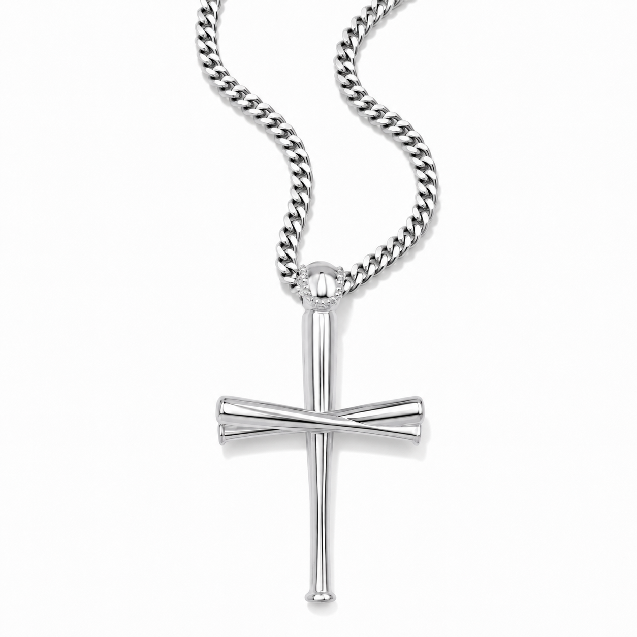 A silver-toned cross pendant necklace with a polished finish, suspended from a matching curb chain against a clean white background.