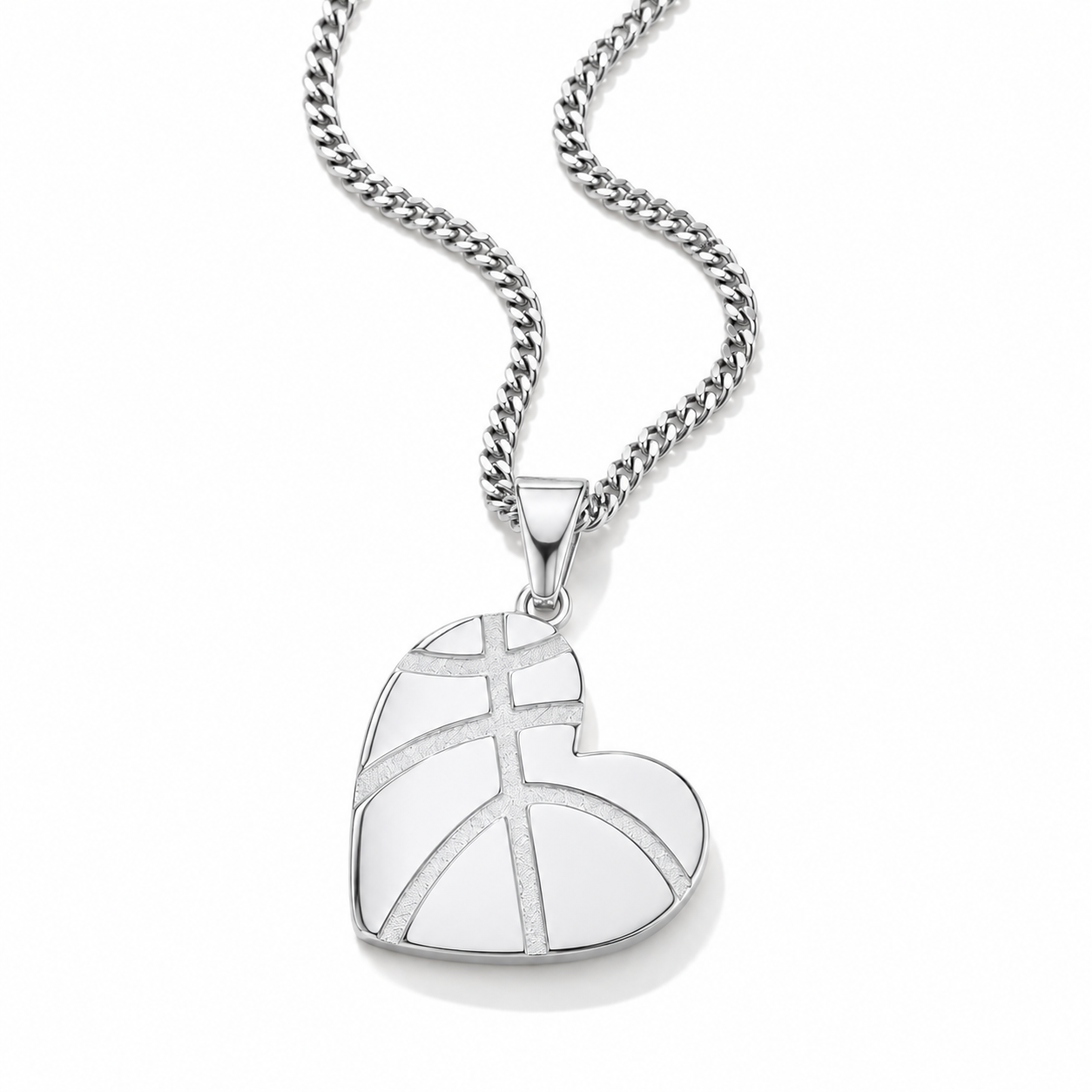 A silver heart-shaped pendant necklace with a basketball-inspired geometric pattern, suspended from a silver curb chain against a clean white background.