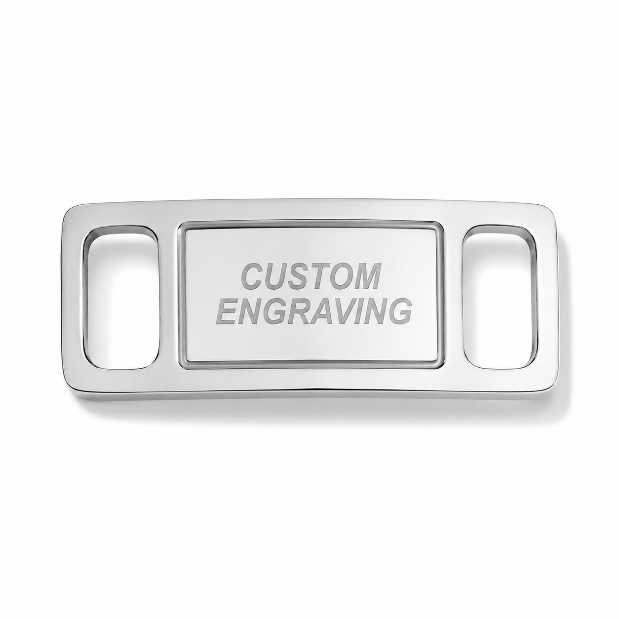 A silver metal belt buckle with a custom engraving slot in the center, featuring the words 'CUSTOM ENGRAVING' on a clean white background.