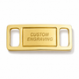 A gold-colored metal belt buckle with a brushed finish, featuring two rounded rectangular cutouts on the sides and the words 'CUSTOM ENGRAVING' printed in the center, set against a plain white background.