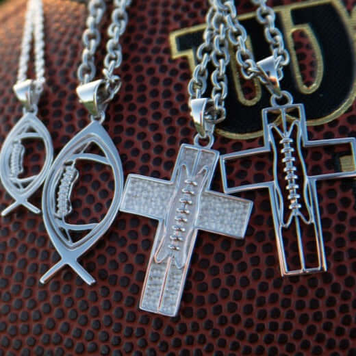 Football Jewelry Bundle | Buy 3 and Get Free Gift featuring silver necklaces with football and cross designs.