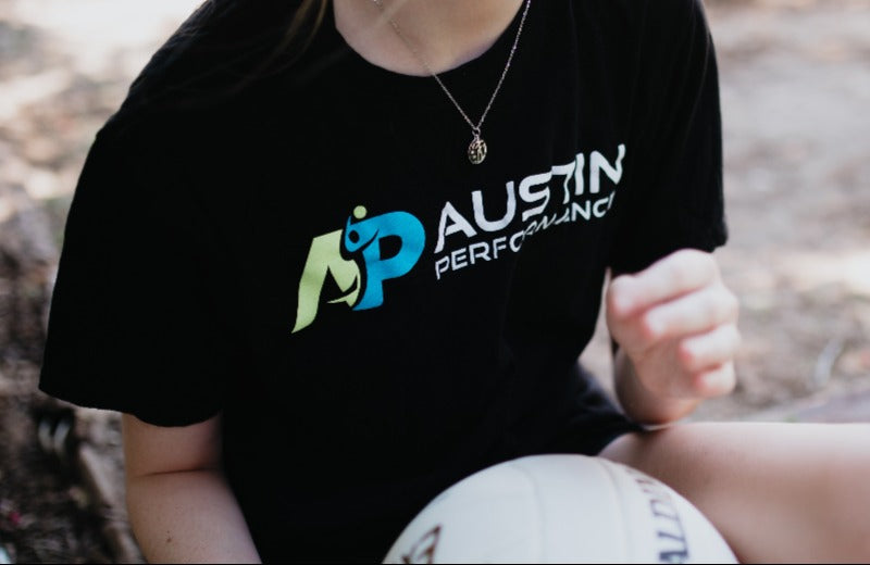 girl-holding-volleyball-wearing0necklace