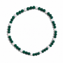 A beaded stretch bracelet featuring dark green faceted beads and alternating clear crystal-like white beads, arranged in a circle on a white background.