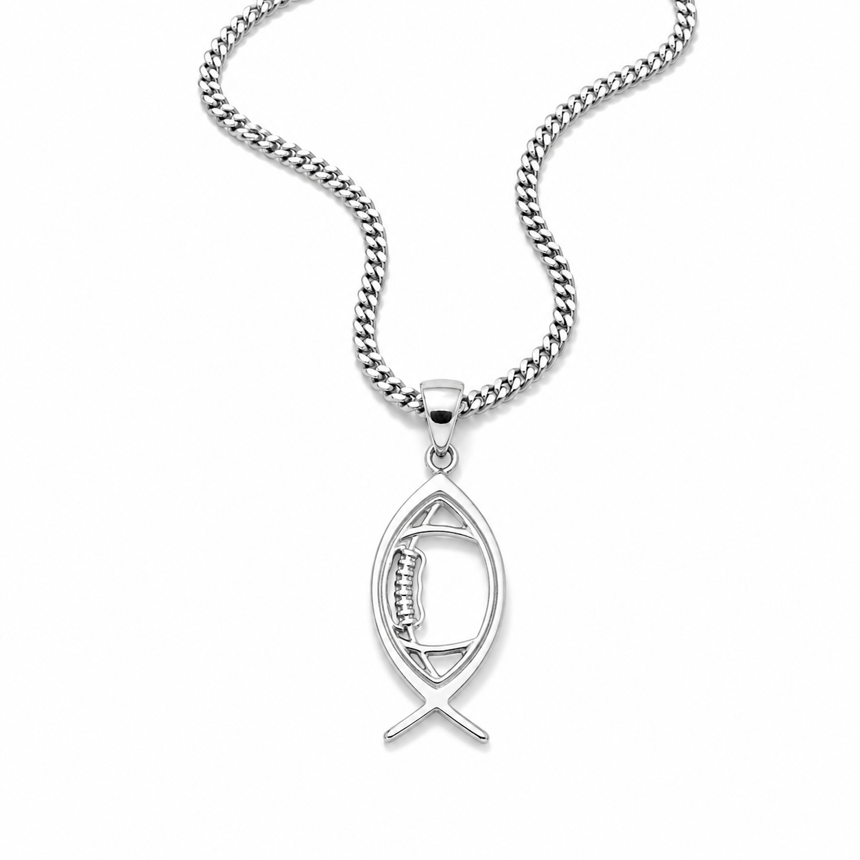 A silver-toned necklace featuring a fish-shaped pendant with a small cross design at the bottom, suspended from a curb chain against a plain white background.