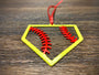 "STEEL HOME" Softball Christmas Ornament featuring a colorful design with stitched softball accents.