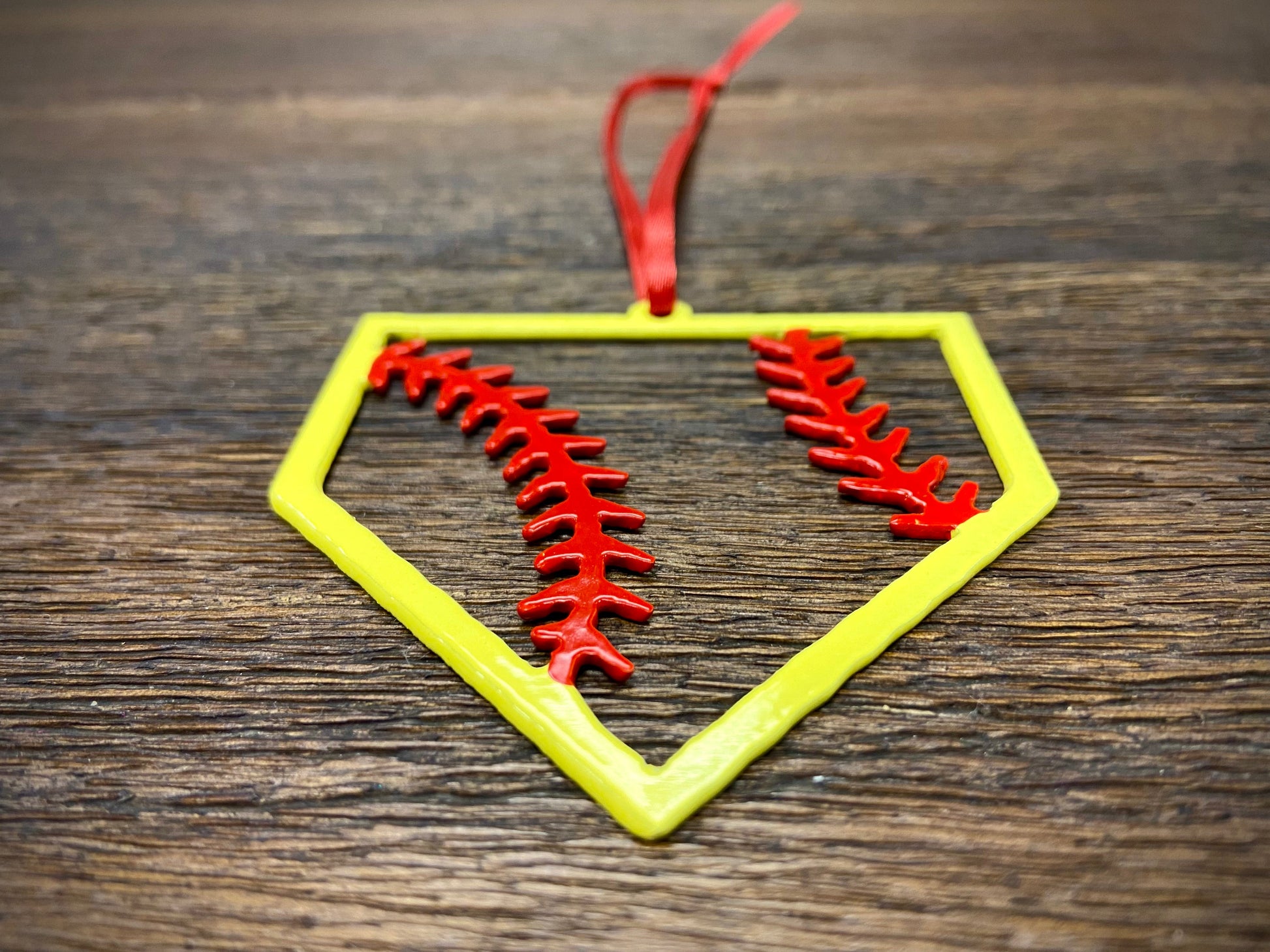"STEEL HOME" Softball Christmas Ornament featuring a colorful design with stitched softball accents.