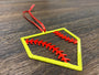 "STEEL HOME" Softball Christmas Ornament featuring a colorful baseball design with red stitches.
