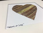 Customizable Baseball Heart Print in 10x10 White Matting featuring a heart design made of baseball seams.