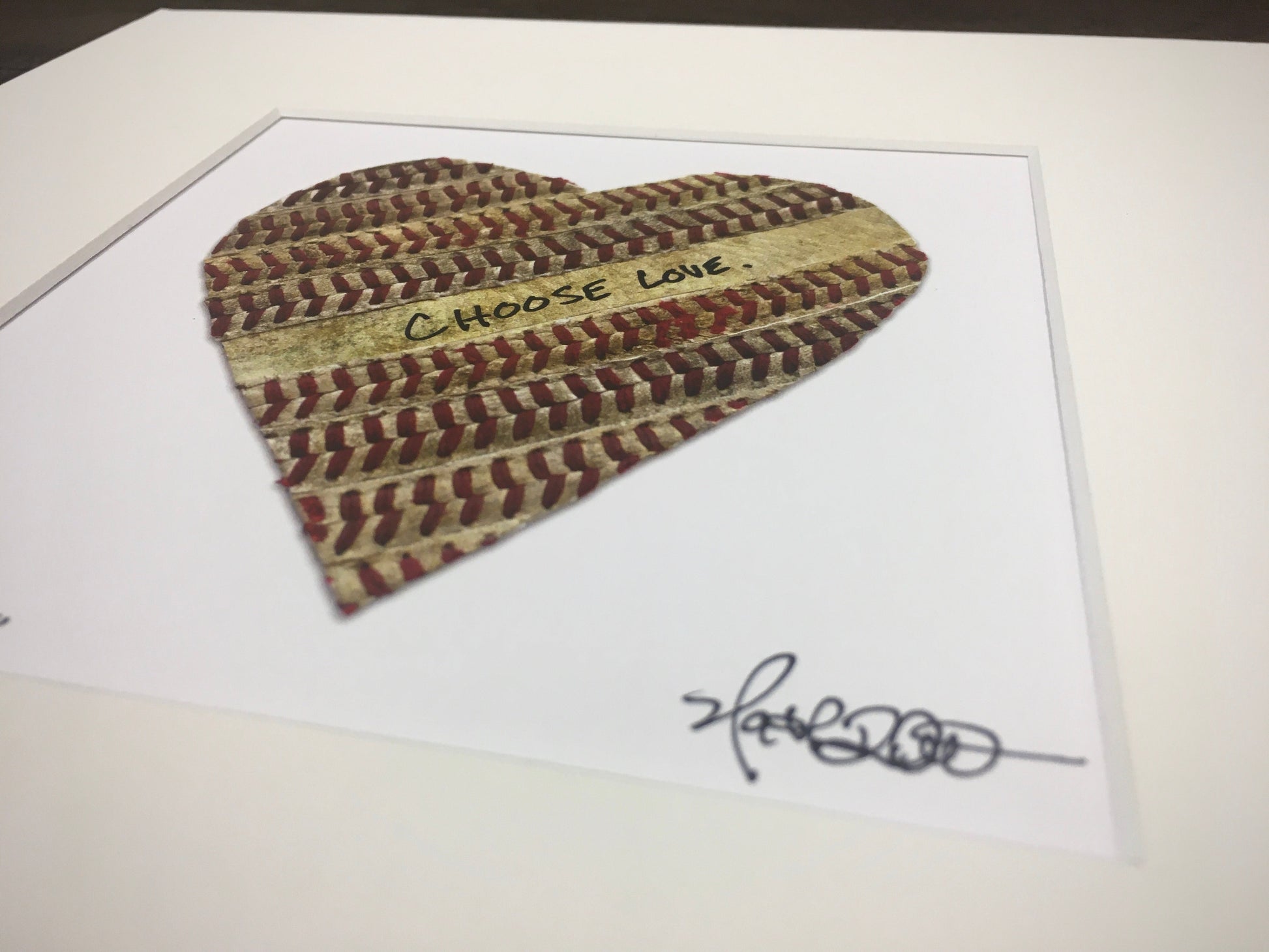 Customizable Baseball Heart Print in 10x10 White Matting featuring a heart made from baseball stitching with 'Choose Love' inscription.