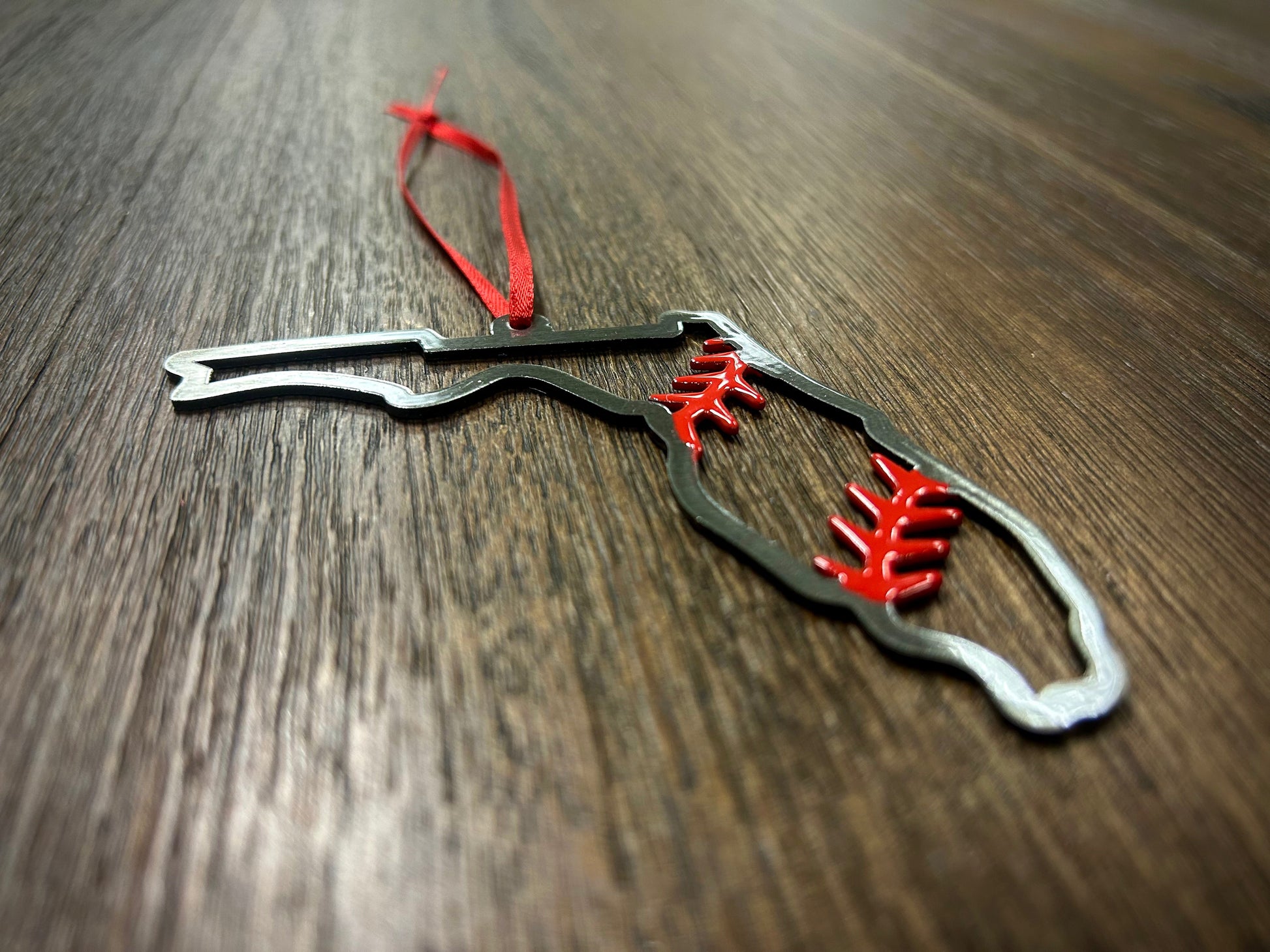 Florida Steel Baseball Christmas Ornament featuring a steel design with red stitching, perfect for holiday decor.