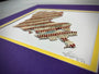 Custom State Artwork - Louisiana made from used baseballs, featuring a unique design with baseball stitching on a colorful mat.