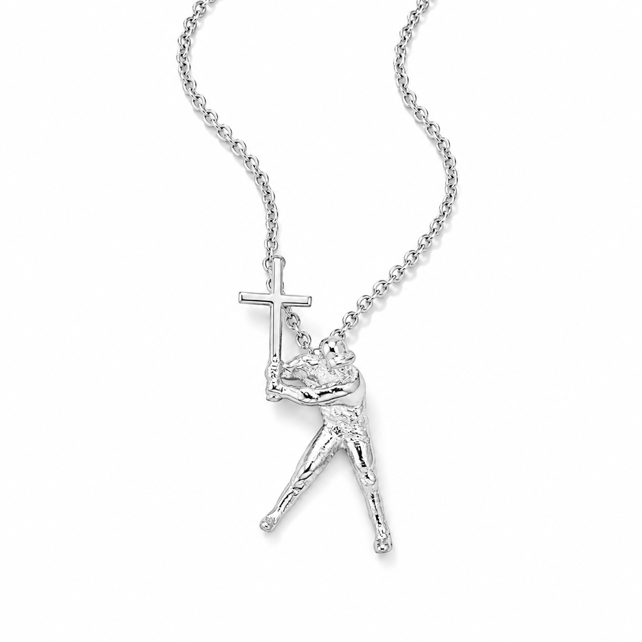 A silver crucifix pendant necklace featuring a detailed figure of Jesus holding the cross, suspended from a delicate silver cable chain against a plain white background.