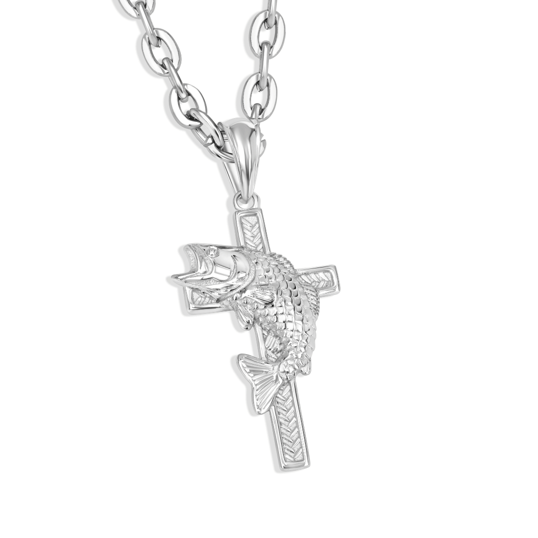 Silver cross pendant with fish in front of the cross necklace on a white background
